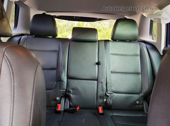 WVGAV7AX9GW610895 2016 VOLKSWAGEN TIGUAN Blue Vista de los asientos traseros