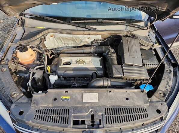 WVGAV7AX9GW610895 2016 VOLKSWAGEN TIGUAN Blue Vista del compartimento del motor