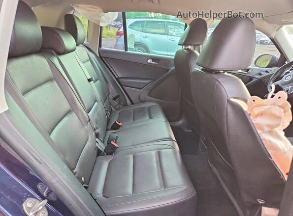 WVGAV7AX9GW610895 2016 VOLKSWAGEN TIGUAN Blue Vista interior trasera