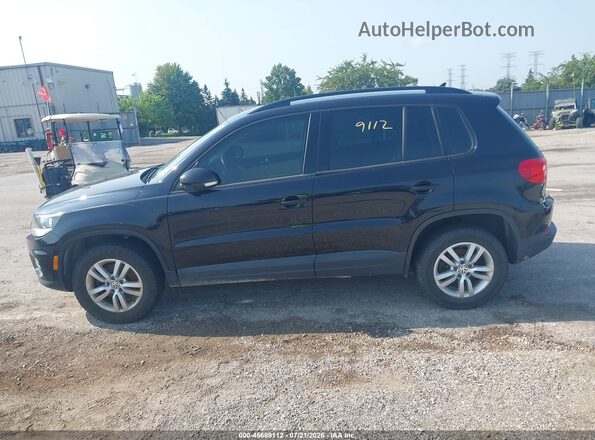 WVGBV7AX3HW508210 2017 VOLKSWAGEN TIGUAN Black Vista interior trasera