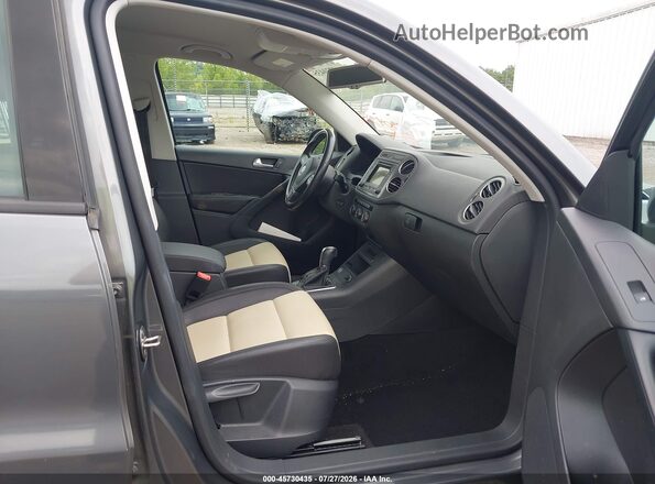 WVGBV7AX8GW597979 2016 VOLKSWAGEN TIGUAN Gray Սալոնի դիմացի տեսք