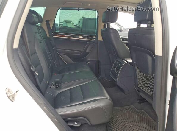 WVGEF9BP0GD011047 2016 VOLKSWAGEN TOUAREG White Rear interior view