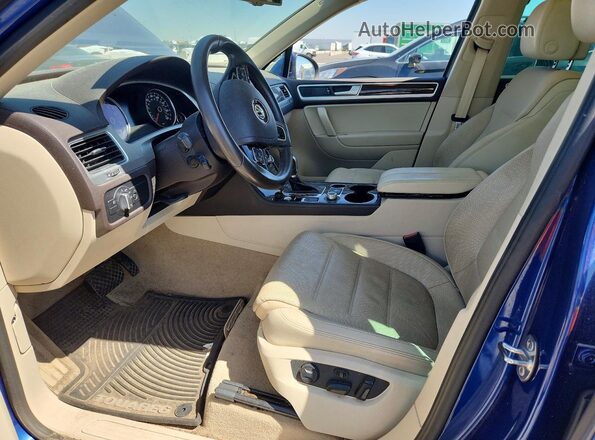 WVGEF9BP2GD010093 2016 VOLKSWAGEN TOUAREG Blue Vista interior delantera