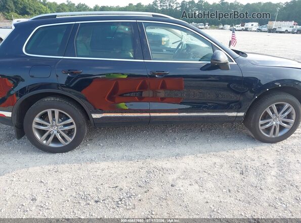 WVGEF9BP9GD004985 2016 VOLKSWAGEN TOUAREG Black Widok wnętrza z tyłu