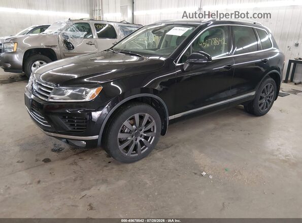 WVGEP9BP2GD003304 2016 VOLKSWAGEN TOUAREG Black Vista tres cuartos delantera izquierda