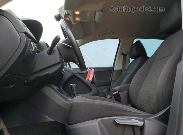 WVGJV7AX0GW617864 2016 VOLKSWAGEN TIGUAN Black Widok wnętrza z przodu