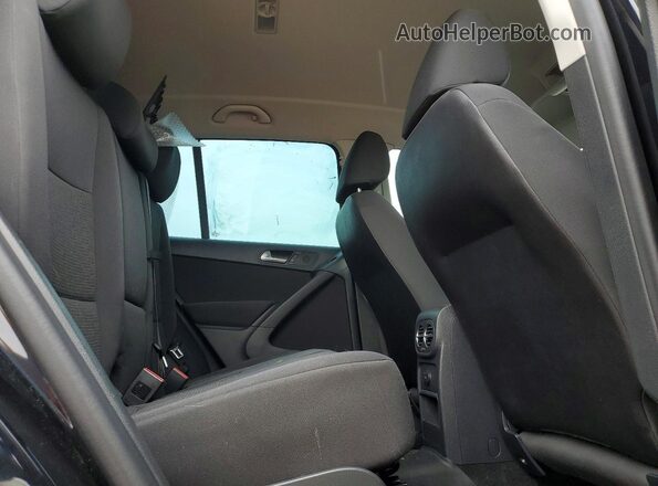 WVGJV7AX0GW617864 2016 VOLKSWAGEN TIGUAN Black Widok tylnych siedzeń