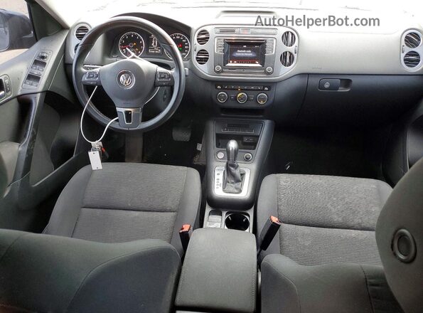 WVGJV7AX0GW617864 2016 VOLKSWAGEN TIGUAN Black Widok deski rozdzielczej