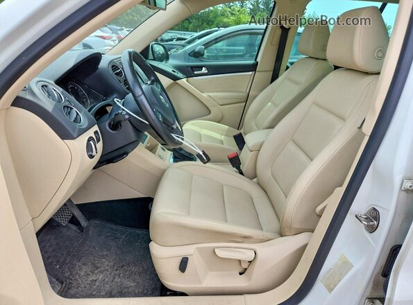 WVGJV7AX7GW504722 2016 VOLKSWAGEN TIGUAN White წინა სალონის ხედი