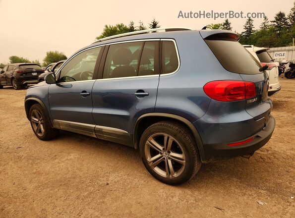 WVGLV7AX8HK010046 2017 VOLKSWAGEN TIGUAN Blue Trasero izquierdo