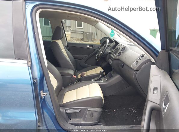 WVGRV7AX6HW507941 2017 VOLKSWAGEN TIGUAN Blue Vista interior delantera