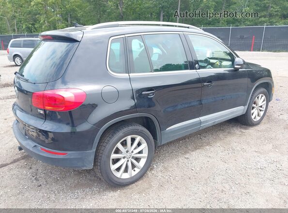 WVGRV7AX7HW506362 2017 VOLKSWAGEN TIGUAN Black Tył prawy