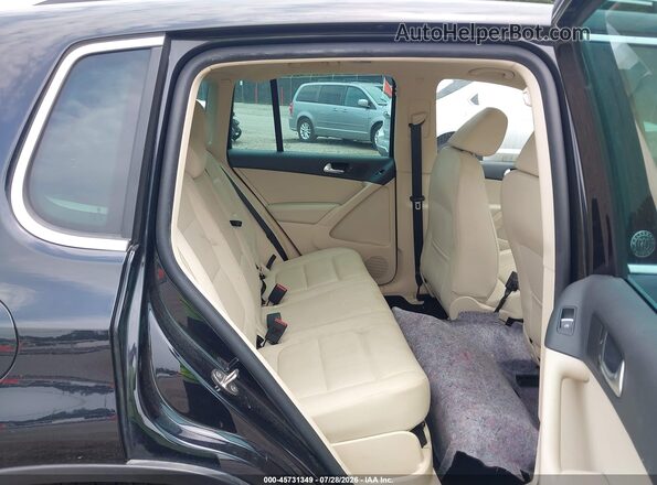 WVGRV7AX7HW506362 2017 VOLKSWAGEN TIGUAN Black Widok naklejki z numerem VIN