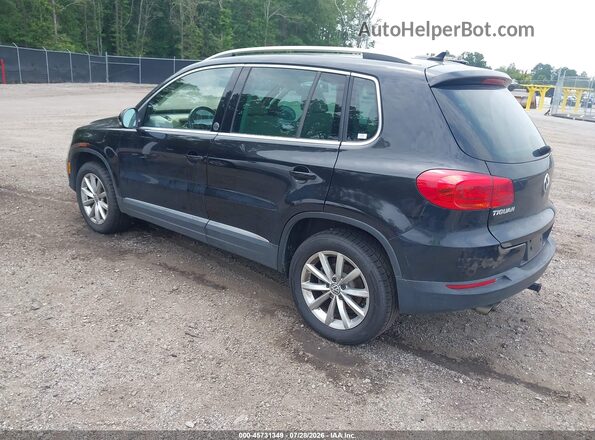 WVGRV7AX7HW506362 2017 VOLKSWAGEN TIGUAN Black Tył lewy