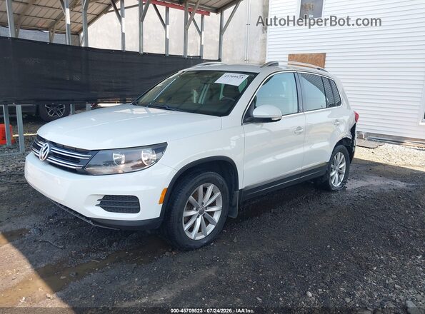 WVGSV7AX1HK005881 2017 VOLKSWAGEN TIGUAN White Vista tres cuartos delantera izquierda