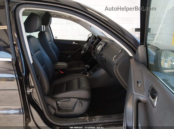 WVGSV7AX9HW511631 2017 VOLKSWAGEN TIGUAN Черный Вид салона спереди