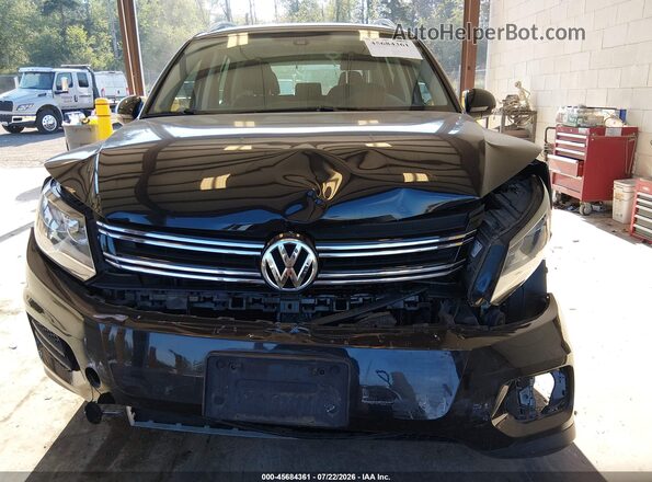 WVGSV7AX9HW511631 2017 VOLKSWAGEN TIGUAN Черный Вид задней части салона