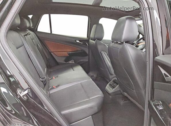 WVGTMPE27MP034675 2021 VOLKSWAGEN ID.4 Black Vista interior trasera