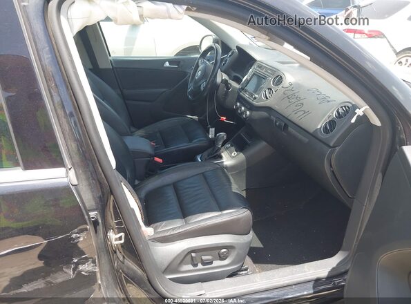 WVGTV7AX5HW507306 2017 VOLKSWAGEN TIGUAN Black Vista interior delantera