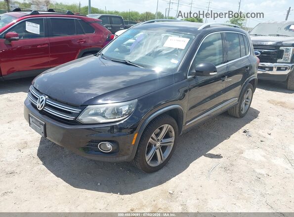 WVGTV7AX5HW507306 2017 VOLKSWAGEN TIGUAN Black Vista tres cuartos delantera izquierda