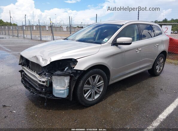 YV440MDU3H2018835 2017 VOLVO XC60 Gold წინა მარცხენა ხედი სამი მეოთხედიდან