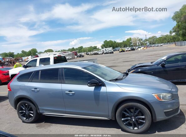 YV440MWK2J2056378 2018 VOLVO V60 CROSS COUNTRY Light Blue Սալոնի հետևի տեսք