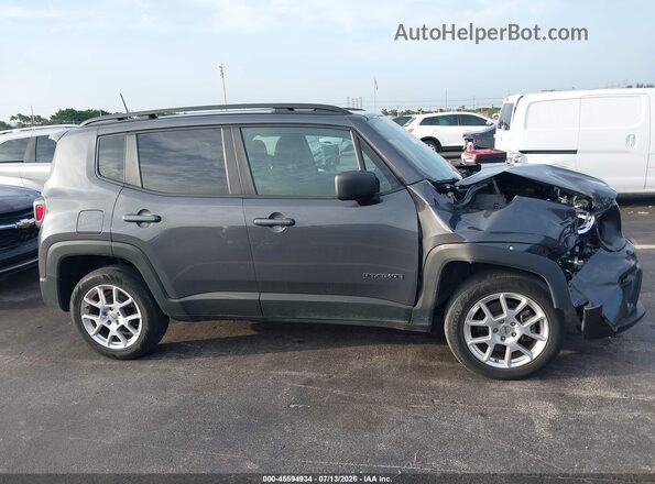 ZACNJDB16PPP28925 2023 JEEP RENEGADE Gray Vista interior trasera