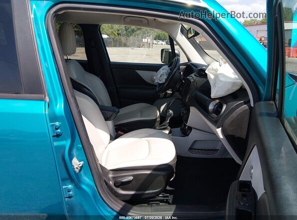 ZACNJDD10MPM26541 2021 JEEP RENEGADE Бирюзовый Вид салона спереди