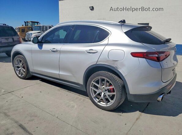 ZASFAKBN1J7B97630 2018 ALFA ROMEO STELVIO Серебряный Задняя левая четверть