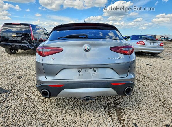 ZASFAKNN3J7C10647 2018 ALFA ROMEO STELVIO Серебряный Вид сзади