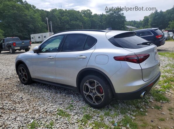 ZASFAKPN1J7B92565 2018 ALFA ROMEO STELVIO Gray Trasero izquierdo