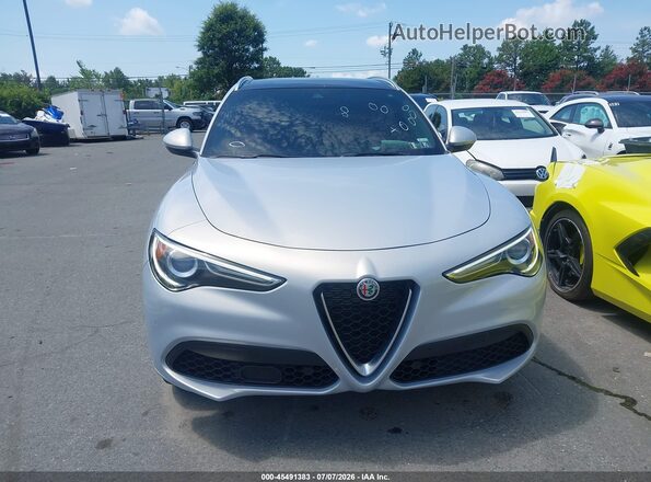ZASPAKBNXM7D14257 2021 ALFA ROMEO STELVIO Light Blue Vista interior trasera
