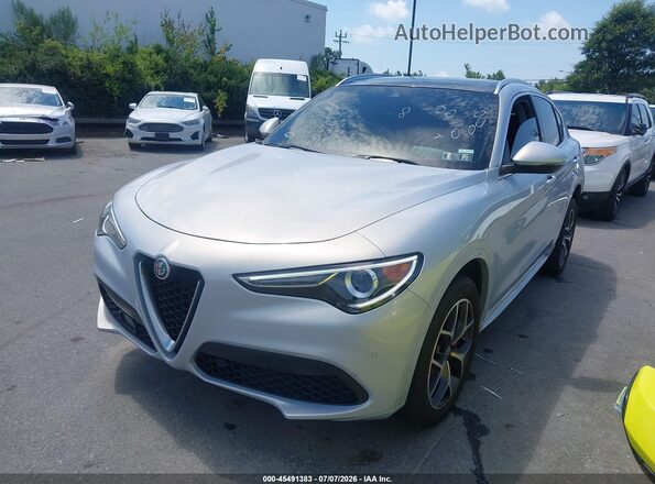 ZASPAKBNXM7D14257 2021 ALFA ROMEO STELVIO Light Blue Vista tres cuartos delantera izquierda