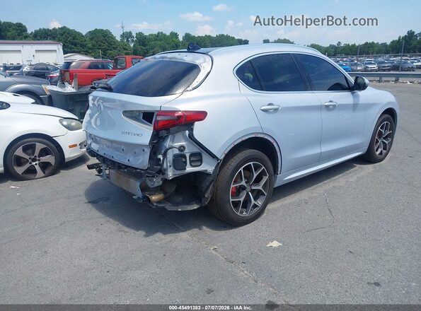 ZASPAKBNXM7D14257 2021 ALFA ROMEO STELVIO Light Blue Trasero derecho