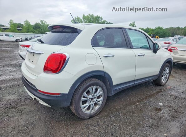 ZFBCFXBTXGP468530 2016 FIAT 500X Cream Trasero derecho