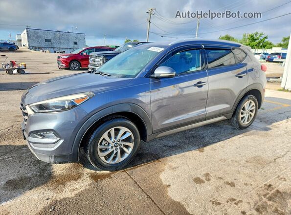 KM8J3CA26GU050249 2016 HYUNDAI TUCSON Gray უკანა მარცხენა