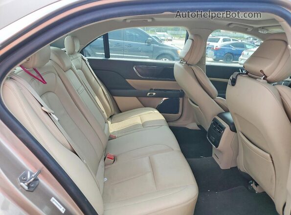 1LN6L9SKXK5602958 2019 LINCOLN CONTINENTA Gold Widok wnętrza z tyłu