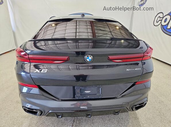 5UX33EX03R9S90779 2024 BMW X6 Black წინა სალონის ხედი