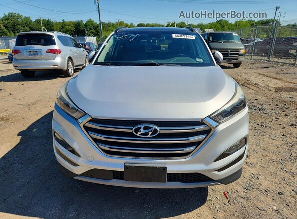 KM8J3CA23JU615371 2018 HYUNDAI TUCSON Silver Vista trasera