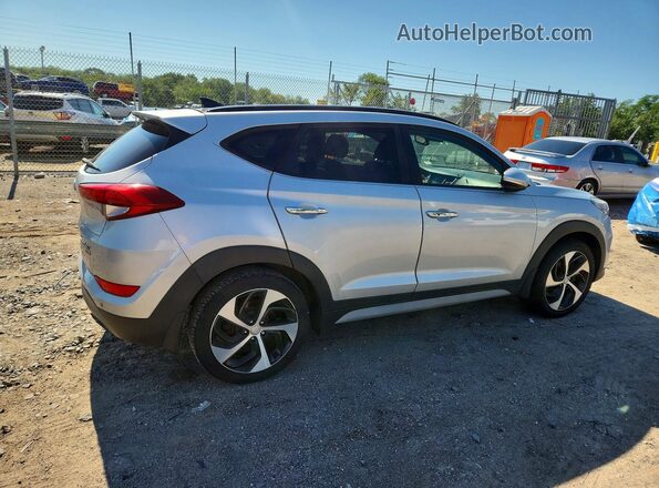 KM8J3CA23JU615371 2018 HYUNDAI TUCSON Silver Delantero derecho