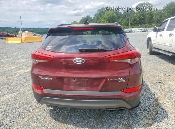 KM8J3CA28GU084659 2016 HYUNDAI TUCSON Темно-бордовый Вид салона спереди