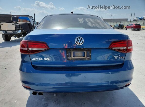 3VWL07AJ4GM393745 2016 VOLKSWAGEN JETTA Blue Вид салону спереду