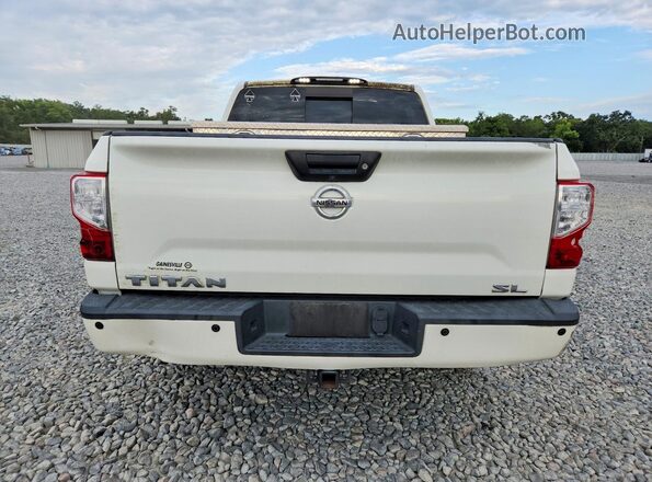 1N6AA1E6XHN502255 2017 NISSAN TITAN White Front interior view