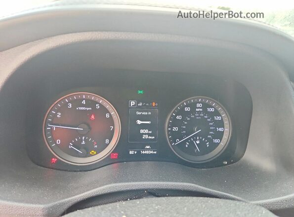 KM8J33A20GU076961 2016 HYUNDAI TUCSON Brown Vista de los asientos traseros