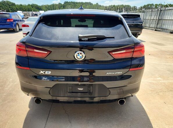 WBXYJ1C06N5U39007 2022 BMW X2 Black Вид салону спереду