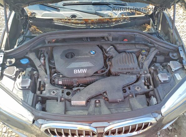 WBXHT3C31GP882429 2016 BMW X1 Gray VIN sticker view