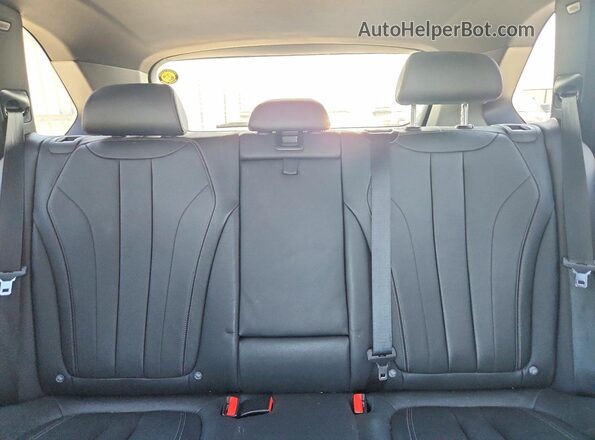 5UXKT0C55J0V99470 2018 BMW X5 Черный Вид задней части салона