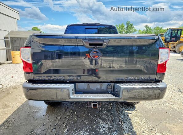 1N6BA1F4XKN512177 2019 NISSAN TITAN Black Vista interior delantera