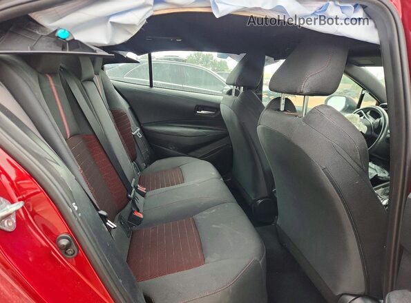 5YFS4MCE1PP155104 2023 TOYOTA COROLLA Maroon Vista interior trasera