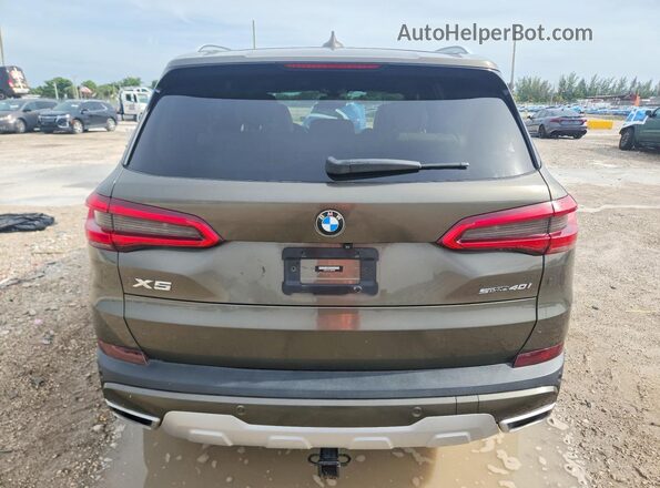 5UXCR4C07L9B83209 2020 BMW X5 Green Front interior view